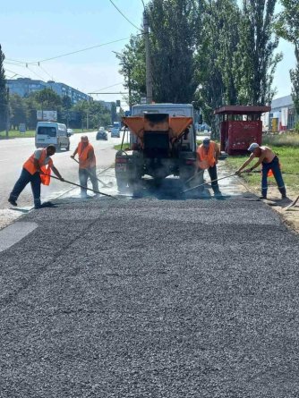 Комунальники КП “Челуаш” завершили роботи з асфальтування тротуару